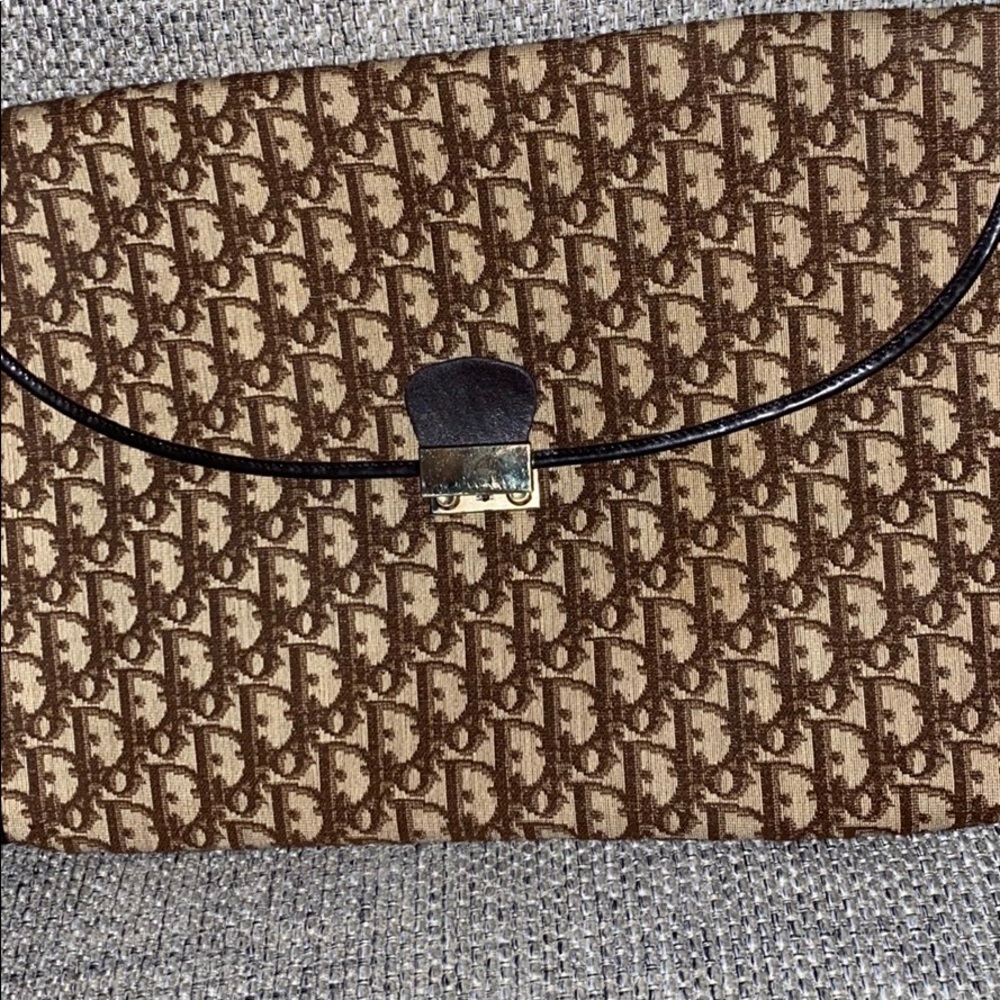 Christian Dior 1980’s vintage lock-clutch